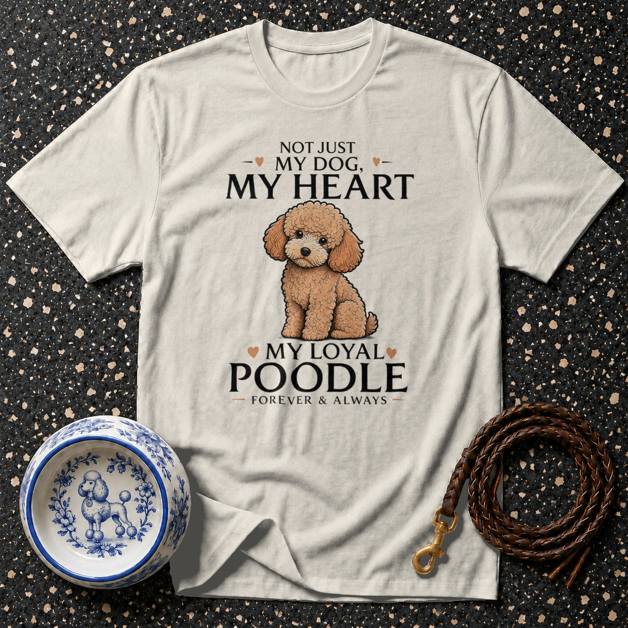 Cream t-shirt with a poodle illustration and text: Not Just My Dog, My Heart; My Loyal Poodle.