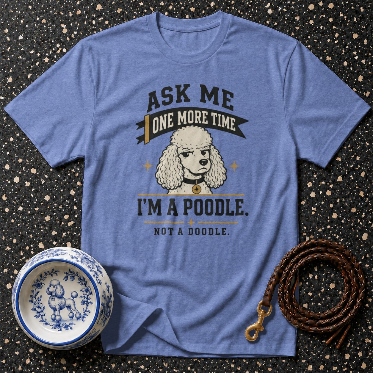 Blue t-shirt with a poodle graphic and text reading "Ask me one more time, I'm a poodle. Not a doodle."