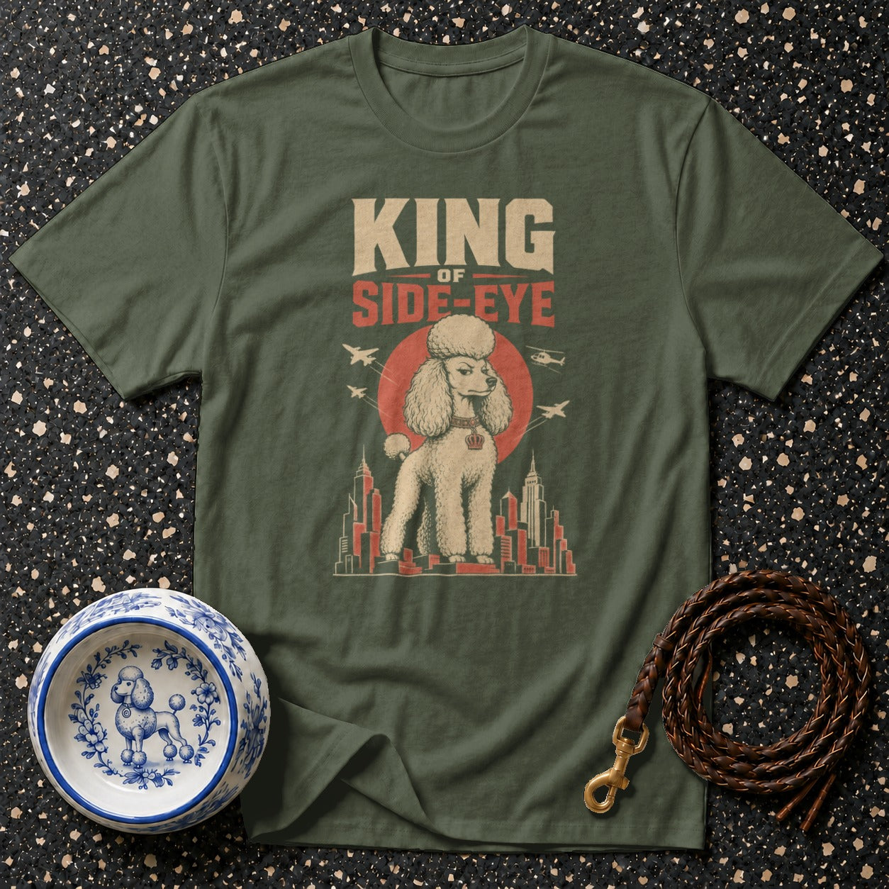 Green t-shirt with poodle graphic and text "KING OF SIDE-EYE."