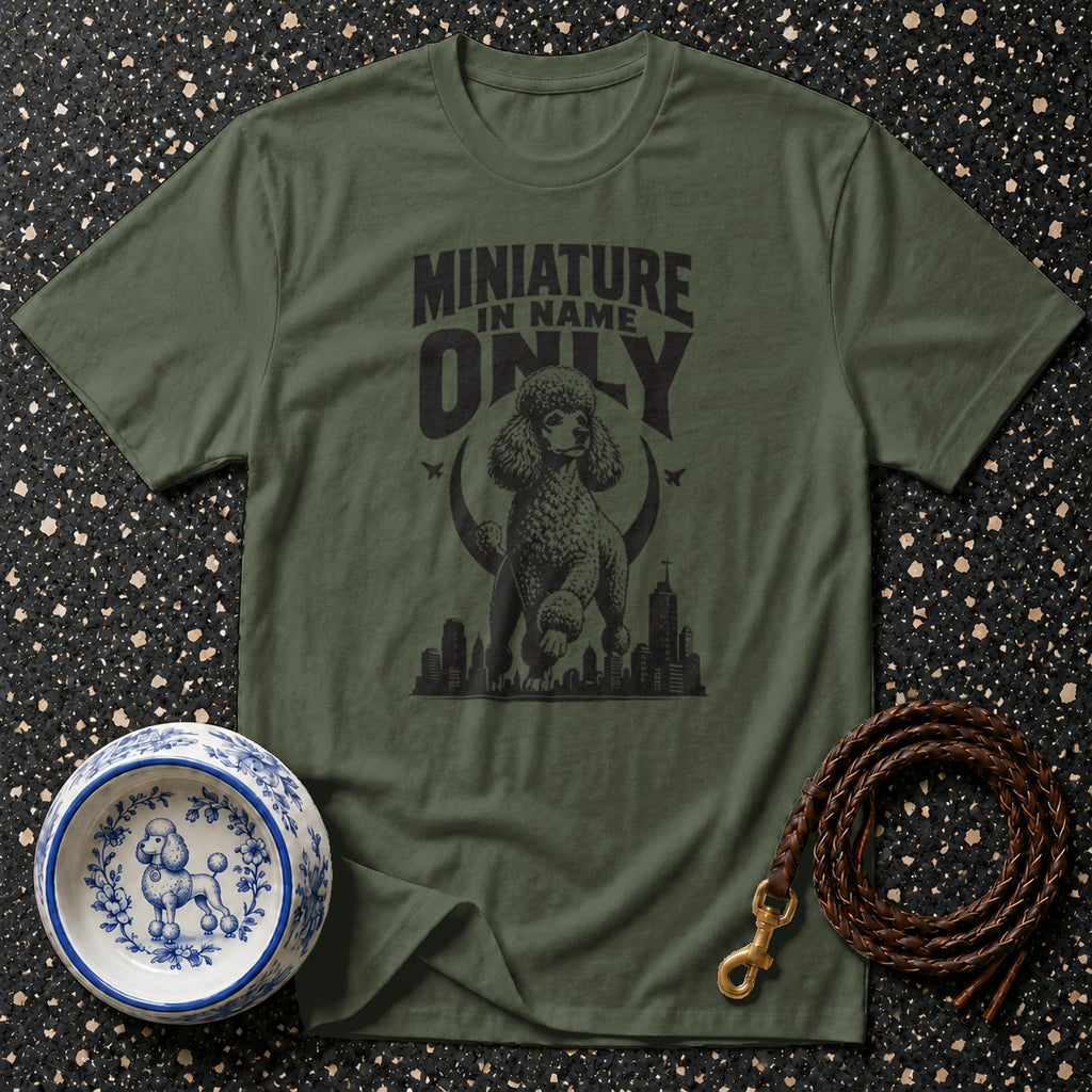 Green t-shirt with poodle graphic and text "MINIATURE IN NAME ONLY".