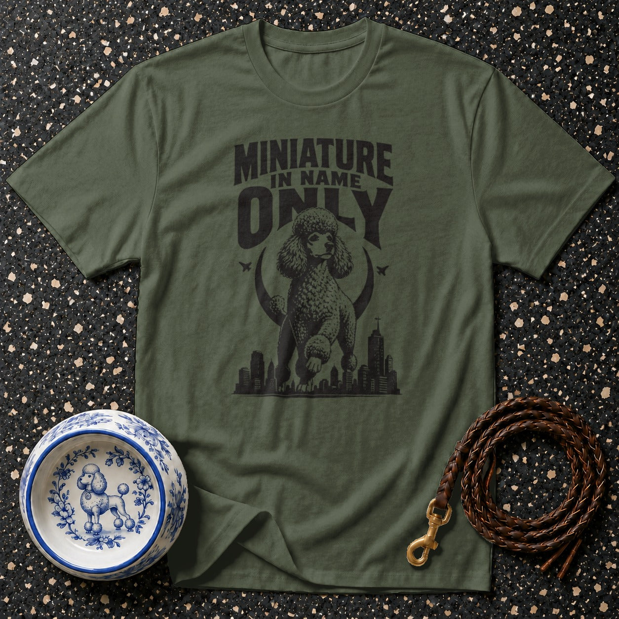 Green t-shirt with poodle graphic and text "MINIATURE IN NAME ONLY".