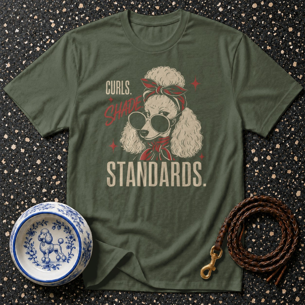 Olive green t-shirt with a poodle wearing sunglasses and bandana, text reads "Curls. Shade. Standards."