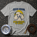 Gray t-shirt with a poodle in a yellow raincoat and text "Fresh Groom. 100% Chance of Rain."