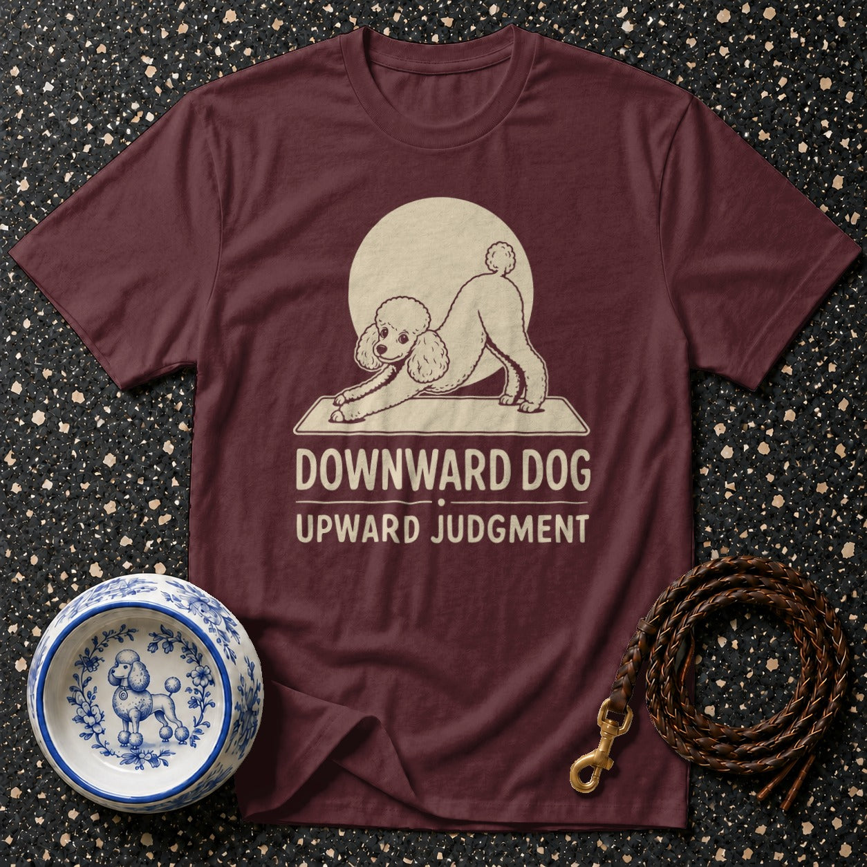 Maroon t-shirt with poodle in downward dog pose and text "DOWNWARD DOG UPWARD JUDGMENT".