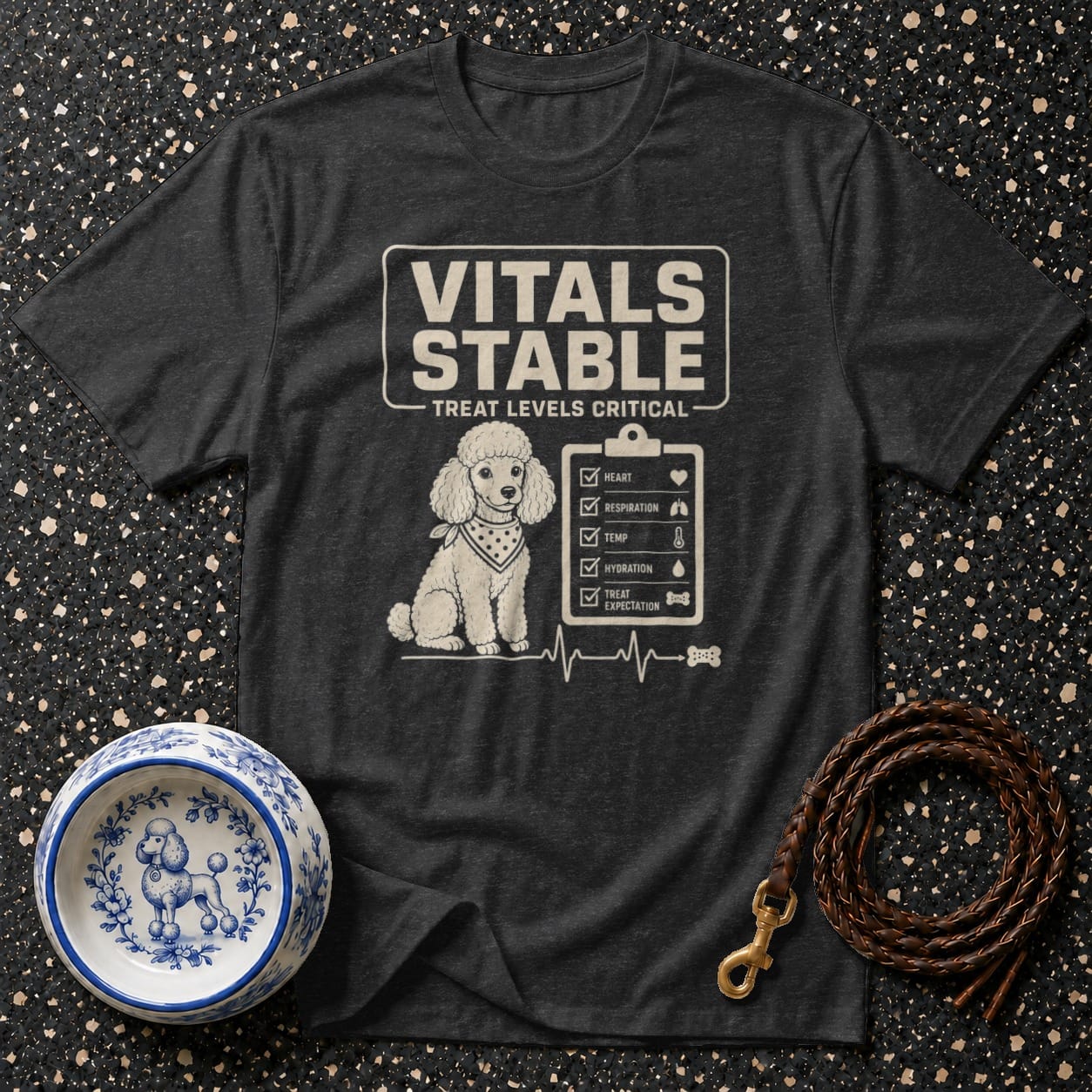 Dark grey t-shirt with poodle graphic and "Vitals Stable Treat Levels Critical" text.
