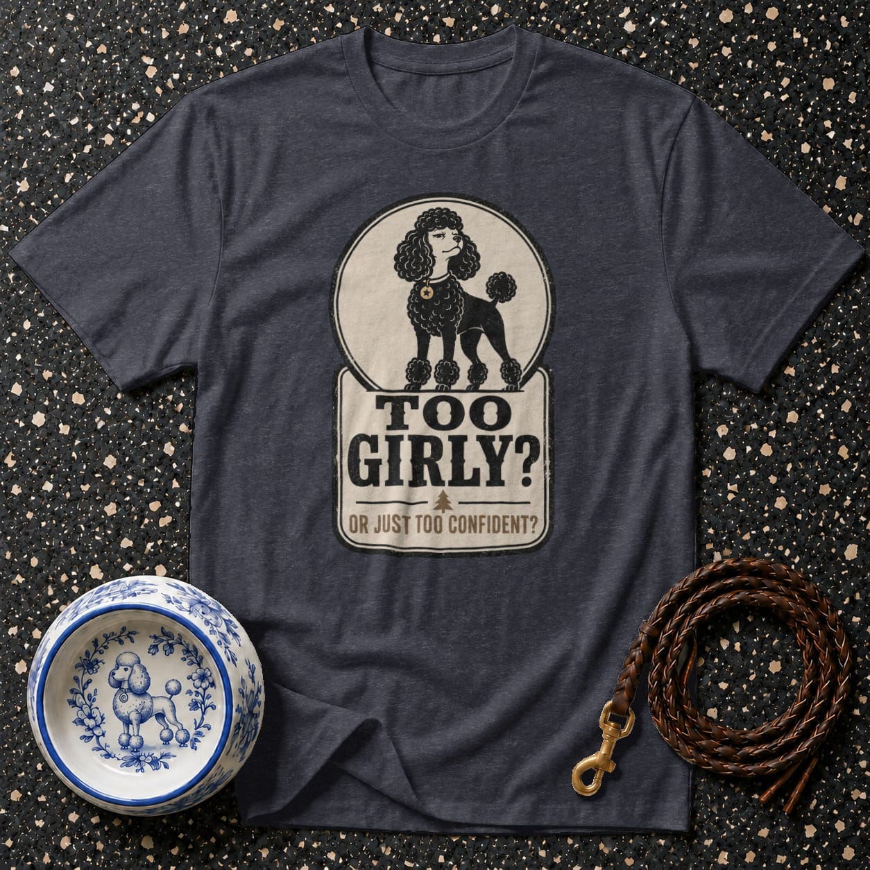 T-shirt with graphic of poodle and text "Too Girly? Or Just Too Confident?"