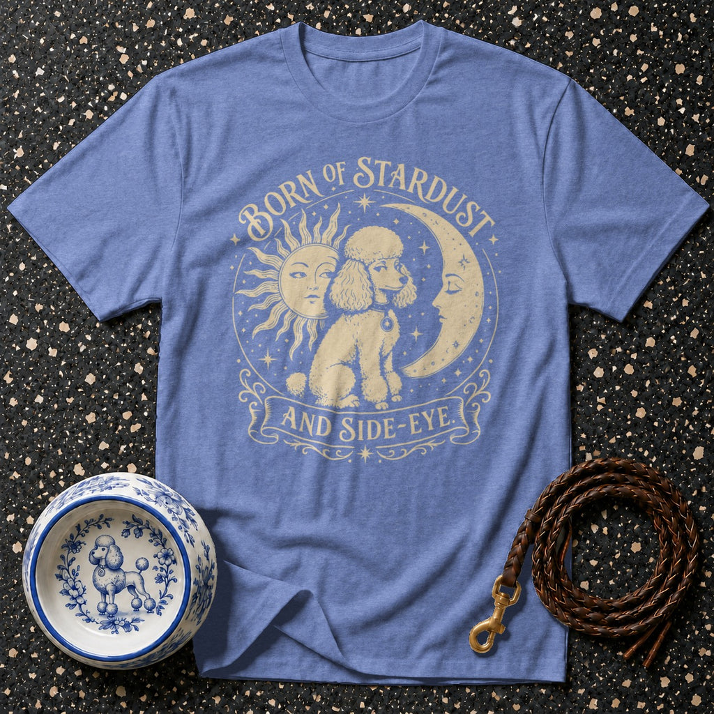Blue t-shirt with "Born of Stardust and Side-Eye" text and poodle graphic.