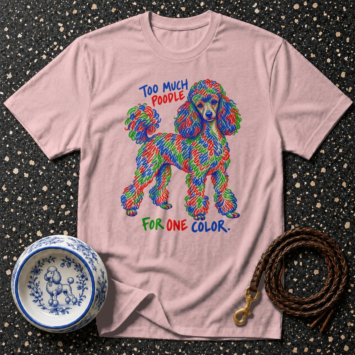 Pink t-shirt with a colorful poodle graphic and text.
