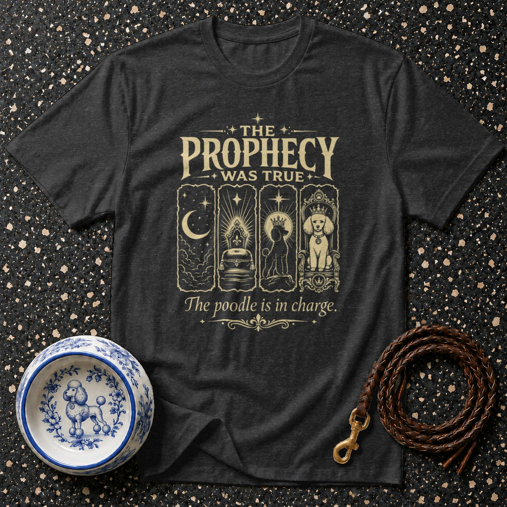 Dark t-shirt with "The Prophecy Was True" and "The poodle is in charge" text.