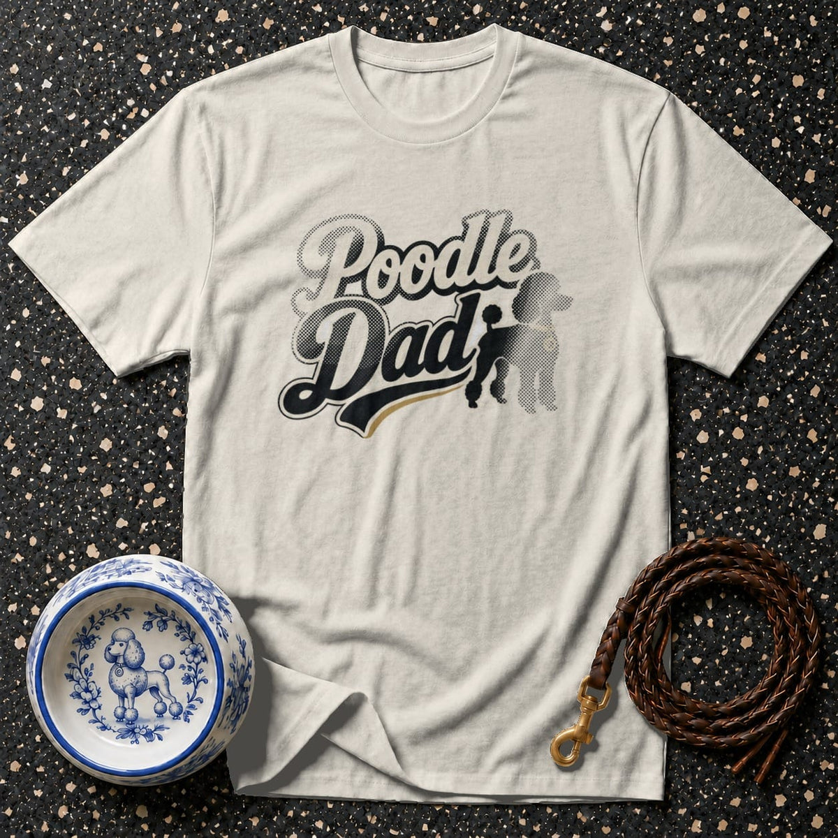 Cream t-shirt with "Poodle Dad" graphic, poodle bowl, and leather leash.