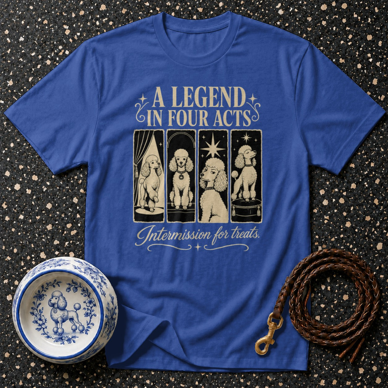 Blue t-shirt with "A Legend in Four Acts" and poodles, plus a dog bowl.