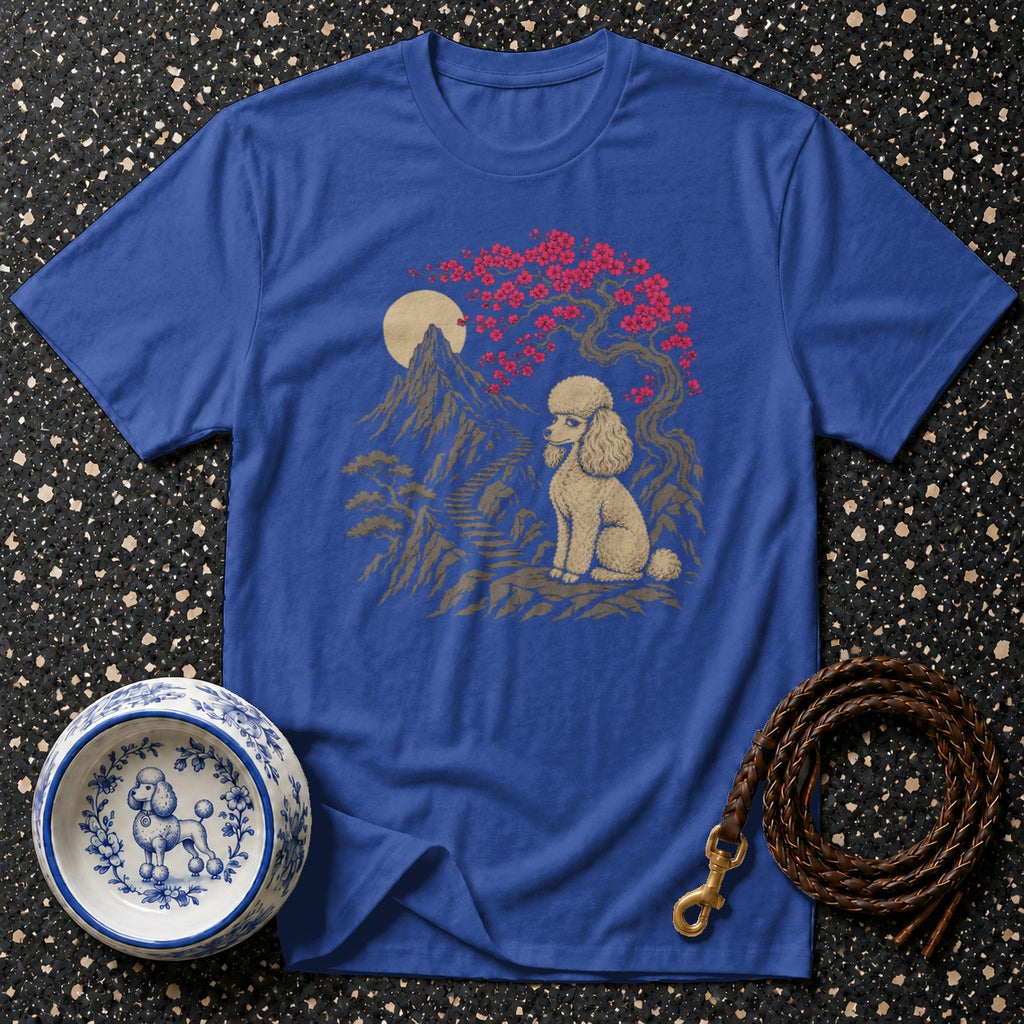 Blue t-shirt with poodle, mountains, cherry blossoms, and moon graphic.