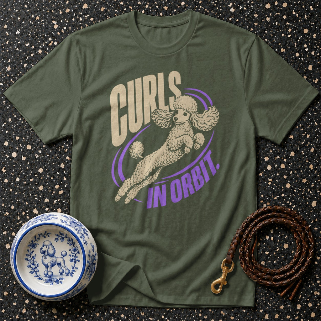 Green t-shirt with a poodle design that says "Curls In Orbit".