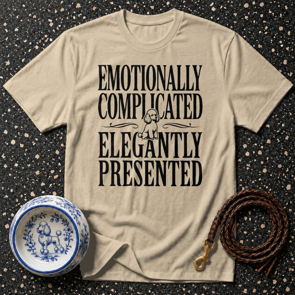 Beige t-shirt with poodle graphic and text: "Emotionally Complicated Elegantly Presented".